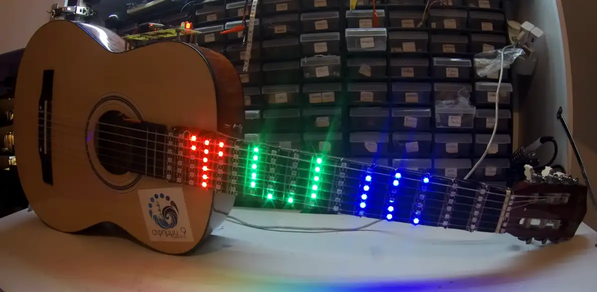 LED Guitar project showing RGB LED strip lighting up guitar fretboard notes